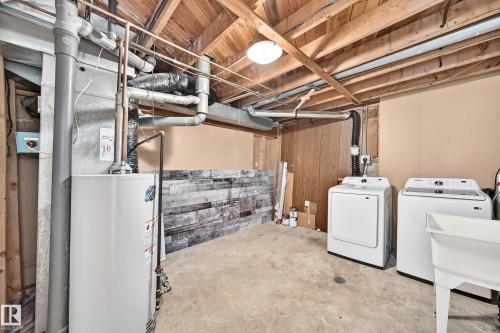 261 Callingwood Two Nw, Edmonton, AB - Indoor Photo Showing Laundry Room