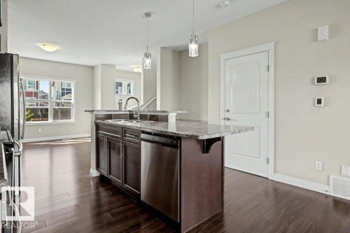 2 Simmonds Place, Leduc, AB - Indoor Photo Showing Kitchen With Upgraded Kitchen