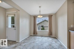 Spacious dining room looking over the back deck and yard - 