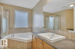 Unique main four piece bath offering a corner soaker tub and a separate stand up shower - 