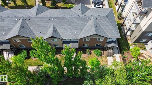Multi-unit residential building with peaked asphalt shingle roofing - 25 12004 22 Avenue, Edmonton, AB - Outdoor