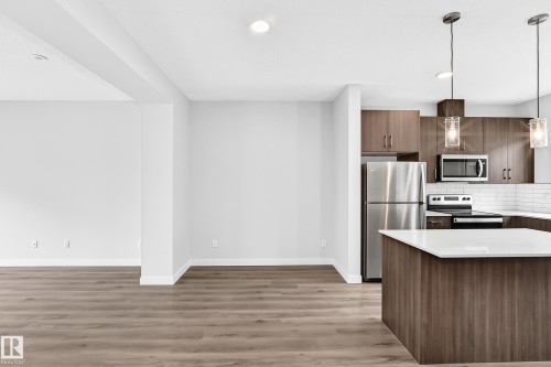 #82 11910 35 Av Sw, Edmonton, AB - Indoor Photo Showing Kitchen With Stainless Steel Kitchen With Upgraded Kitchen