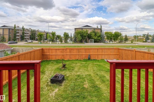 Expansive fenced backyard with a manicured lawn - 1216 37C Avenue Nw, Edmonton, AB - Outdoor