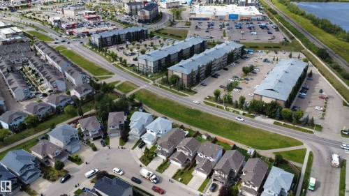 Aerial perspective showcasing a residential community with varied architectural styles - 1216 37C Avenue Nw, Edmonton, AB - Outdoor With View