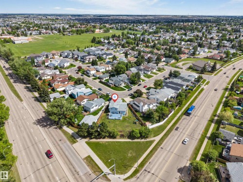 Aerial perspective showcasing a residential neighborhood with tree-lined streets - 3332 43 Street, Edmonton, AB 