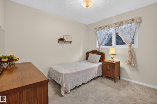 Neutral tone wall color with textured ceiling - 17603 85 Avenue Nw, Edmonton, AB 