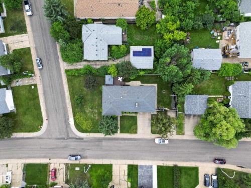 Residential property with a gray shingle roof and a paved driveway - 17603 85 Avenue Nw, Edmonton, AB 
