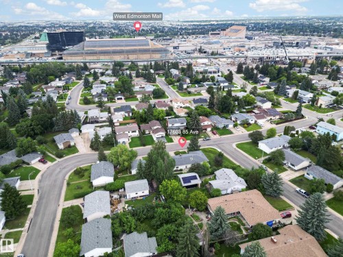 Residential neighborhood featuring mature trees and established homes with varied rooflines - 17603 85 Avenue Nw, Edmonton, AB 