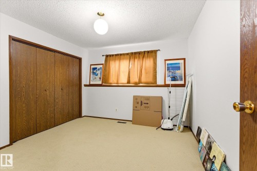 Room featuring light-colored carpeting, white walls, and a window with a wood sill - 59 Patterson Crescent, St. Albert, AB - Indoor Photo Showing Other Room