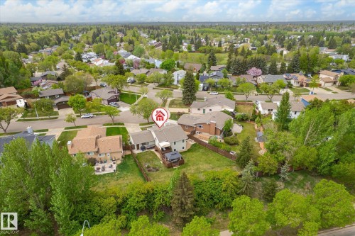 Aerial perspective showcasing a residential neighborhood with extensive tree coverage - 59 Patterson Crescent, St. Albert, AB - Outdoor With View