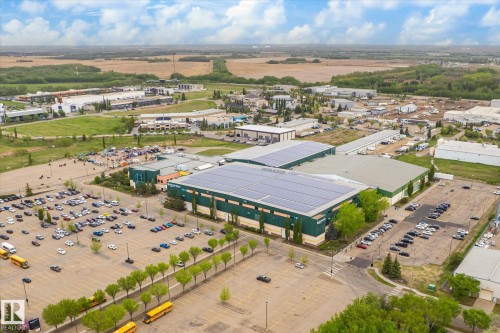 Expansive commercial property featuring multiple large buildings with green and beige facades - 59 Patterson Crescent, St. Albert, AB - Outdoor With View