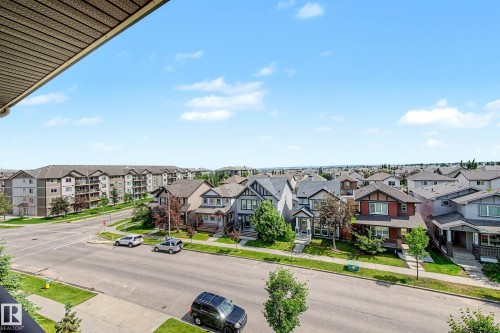 Expansive neighborhood panorama featuring a mix of residential homes and multi-story apartment buildings - 404 1080 Mcconachie Boulevard, Edmonton, AB 