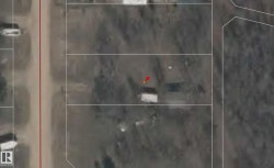 Aerial Property Map. Illustrating the property boundaries and associated structures - 