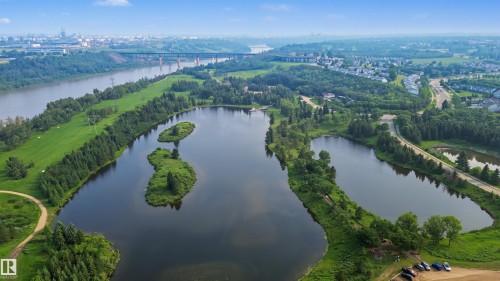 Expansive natural landscape featuring multiple lakes and abundant green space - 15 450 Hyndman Crescent, Edmonton, AB 