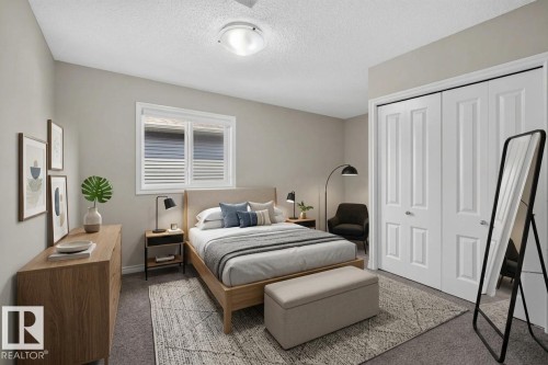 Neutral-toned room featuring a single window with blinds, bi-fold closet doors, and carpet flooring - 2460 15 Avenue, Edmonton, AB 