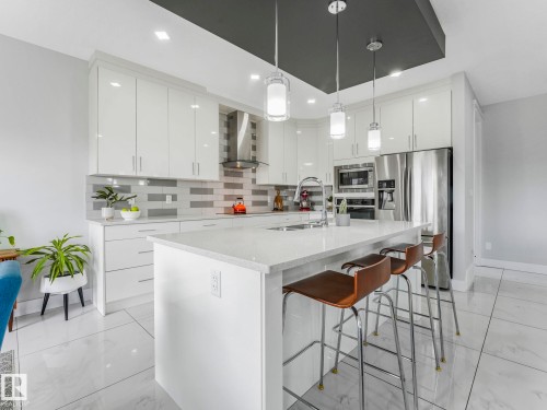 12 Sandalwood Place, Leduc, AB - Indoor Photo Showing Kitchen With Upgraded Kitchen