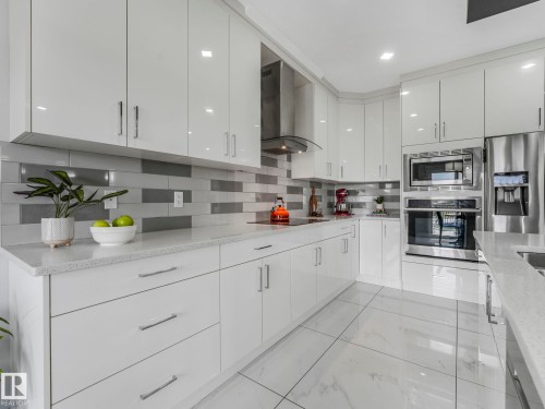 12 Sandalwood Place, Leduc, AB - Indoor Photo Showing Kitchen With Upgraded Kitchen