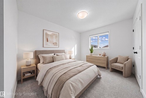 Spacious room featuring light-colored carpeting and a window with white trim - 2953 Coughlan Green Green, Edmonton, AB 