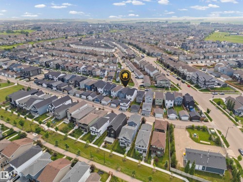 Expansive aerial perspective showcasing a residential neighborhood with numerous detached homes - 2953 Coughlan Green Green, Edmonton, AB 