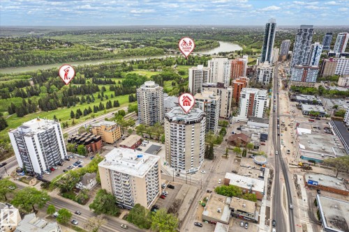 Aerial perspective showcasing a vibrant urban setting with extensive green spaces - 503 10045 117 Street, Edmonton, AB 