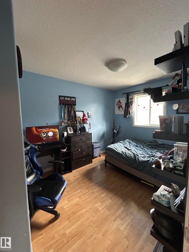 Room featuring light wood-finish flooring and a single window with white trim - 17 Willowby Close, Stony Plain, AB 