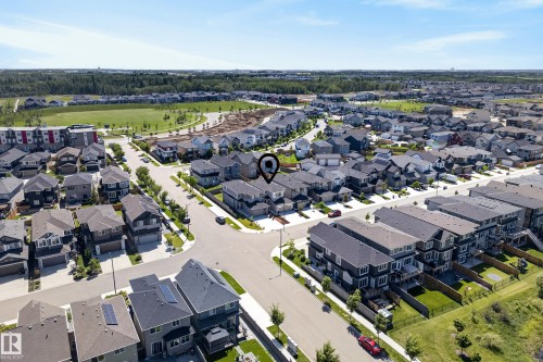 Aerial perspective of a developed residential community with numerous detached and attached properties - 20907 131 Avenue, Edmonton, AB 