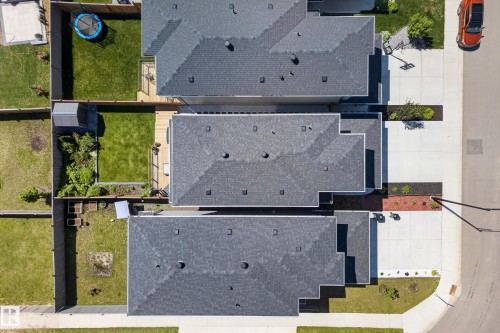 Overhead view of multiple properties, each featuring asphalt shingle roofing - 20907 131 Avenue, Edmonton, AB 