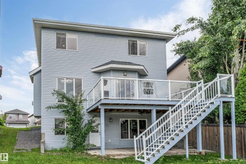 Two-story exterior with light blue siding - 3449 28 Street, Edmonton, AB 