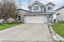 Light blue siding exterior featuring a multi-level design - 3449 28 Street, Edmonton, AB 