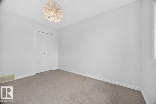Neutral-toned carpeting throughout - 8508 218 Street, Edmonton, AB 