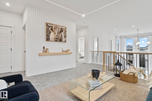 Open concept upper level featuring plush carpeting - 13152 187 Avenue, Edmonton, AB 