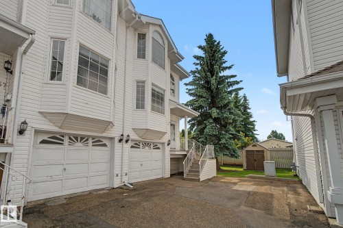 Multi-level exterior with white siding - 4259 29 Avenue, Edmonton, AB 