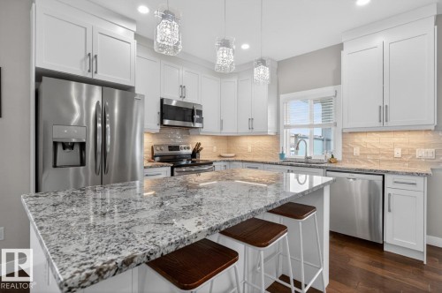 102 Kirpatrick Court, Leduc, AB - Indoor Photo Showing Kitchen With Upgraded Kitchen