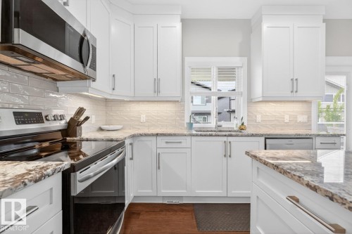 102 Kirpatrick Court, Leduc, AB - Indoor Photo Showing Kitchen With Upgraded Kitchen