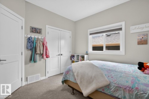 102 Kirpatrick Court, Leduc, AB - Indoor Photo Showing Bedroom