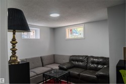 Neutral wall tones complement the bright ceiling light - 