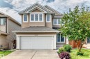 Two-story property featuring a double-bay garage and a gabled roofline - 1330 114B Street, Edmonton, AB 