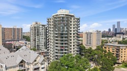 Elevated perspective showcasing a multi-story residential building with tiered balconies - 