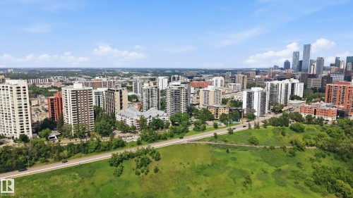 Expansive green space and a multi-lane roadway fronting a collection of high-rise residential buildings - 504 11710 100 Avenue, Edmonton, AB 
