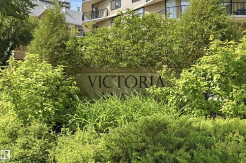 Stone signage featuring "VICTORIA" lettering - 504 11710 100 Avenue, Edmonton, AB 