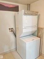 White stackable washer and dryer unit - 