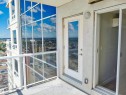Balcony with glass panel railing and cityscape scenery - 2505 10410 102 Avenue, Edmonton, AB 