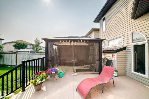 Spacious outdoor deck featuring light-toned composite decking - 8507 179 Avenue, Edmonton, AB 