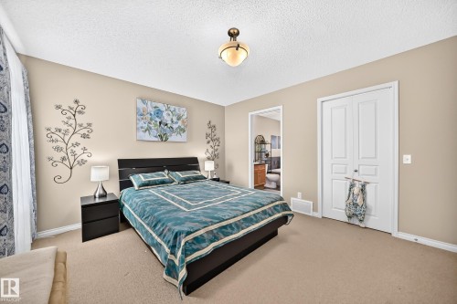 Carpeted bedroom featuring neutral wall tones - 8507 179 Avenue, Edmonton, AB 