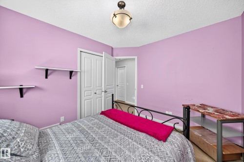 Interior room with vibrant wall color and carpet flooring - 8507 179 Avenue, Edmonton, AB 