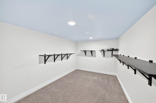 Room featuring light-colored walls, recessed ceiling lighting, and soft carpet flooring - 8507 179 Avenue, Edmonton, AB 