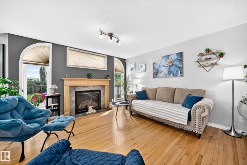 Open concept living area featuring hardwood flooring - 8507 179 Avenue, Edmonton, AB 