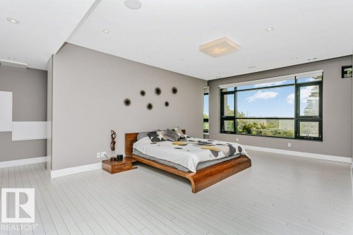 Expansive windows frame the surrounding landscape - 9035 Saskatchewan Drive, Edmonton, AB 