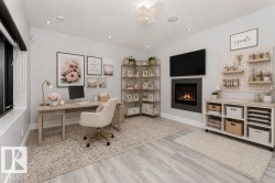 Light-toned wood-finish flooring complements a neutral wall palette - 