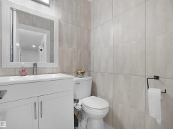 Contemporary vanity with integrated sink and chrome faucet - 